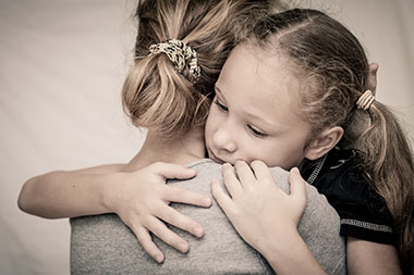 girls hugging