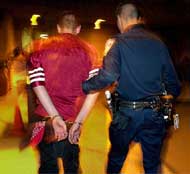 gang member in handcuffs