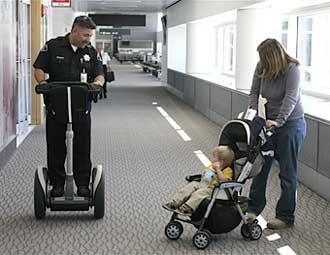 officer talking to a mom